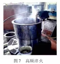 1 引言  山東魯碧建材有限公司2號輥磨為德國進口萊歇磨，主要用于生產(chǎn)礦渣微粉，減速機采用弗蘭德品牌，型號為：KMPP651，其結(jié)構(gòu)為一級傘齒加兩級行星傳動。2013年3月9日，該減速機因功率過高報警，而且潤滑系統(tǒng)回油溫度急劇升高，晚上23：25減速機潤滑站過濾器壓差高報警，整個系統(tǒng)跳停。檢查過濾器濾網(wǎng)時發(fā)現(xiàn)有大量的黃色銅屑，經(jīng)化驗銅屑成分為CuAl10Ni查閱設(shè)備圖紙推測該合金來自二級行星輪中的銅瓦。經(jīng)過咨詢，弗蘭德專家給出了同樣的判斷，并提供了具體的解決方案。隨后， 山東魯碧建材有限公司按照弗蘭德公司出具的方案對該減速機進行了搶修。目前該減速機運行接近兩個月且效果良好?，F(xiàn)將具體原因、修復(fù)方案及預(yù)防措施簡單描述。  2 原因分析  該減速機自2008年2月份開始使用，到現(xiàn)在已運轉(zhuǎn)5年多，運轉(zhuǎn)率接近90%，因此設(shè)備或多或少存在老化問題，尤其是里面的合金瓦，由于自身硬度較低，一旦潤滑不良很容易造成損傷。在拆檢減速機時發(fā)現(xiàn)二級行星有一個行星輪堆積了大量的合金，且無法轉(zhuǎn)動，證明我們的判斷正確。在對該行星輪拆檢中發(fā)現(xiàn)了以下三個問題：（1）兩側(cè)的推力瓦嚴重燒蝕熔化（圖1）；（2）銅瓦處存積了大量油泥并將潤滑油道堵塞，而且銅瓦整個開裂、軸向延展接近30mm（圖2）；（3）銷軸局部裂紋（圖3）。    根據(jù)以上損壞分析，銅瓦潤滑油孔堵塞之后，造成銅瓦急劇升溫，溫度升高到一定程度使得銅瓦受熱開裂并且膨脹延展，最終與兩側(cè)的推力瓦接觸，推力瓦受到擠壓以后迅速升溫最終燒蝕，銷軸因此承受較大的扭矩及高溫，造成裂紋。  3 處理方案  推力瓦、銅瓦、銷軸的方案為按照尺寸重新制作備件。但在檢測齒輪時發(fā)現(xiàn)其內(nèi)孔圓柱度較差以至于變成橢圓，而且表面硬度下降，遠遠低于圖紙要求（HRC55+5）。我們聯(lián)系弗蘭德公司欲購買該齒輪，對方回復(fù)該齒輪需要德國進口，加工周期為6個月，而且為保證齒輪嚙合，建議6個齒輪一起更換。此時， 山東魯碧建材有限公司銷售正處于旺季，該輥磨每天生產(chǎn)3000t微粉，停機6個月對我們的損失可想而知。我們聯(lián)系弗蘭德總部專家要求給出整改方案。對方經(jīng)過詳細計算給出如下方案：擴大齒輪內(nèi)孔直徑，再加一個過渡套，從而保證齒輪的硬度及裝配要求（圖5）。    3.1 過渡套材料選擇 過渡套材料采用42CrMo。該材料強度、淬透性高，韌性好，淬火時變形小，高溫時有高的蠕變強度和持久強度，用于制造要求強度更高和調(diào)質(zhì)截面更大的鍛件。  3.2 處理工藝    （1）鍛打：目的是減小殘留夾雜物的尺寸，使其成分趨于均勻，組織趨于致密，細化晶粒，改善鋼的性能。    （2）粗車：單邊留4mm加工余量。    （3）著色探傷：目的是檢查工件是否有損傷，從而保證下一道工序順利進行。    （4）完全退火：目的是使工件的內(nèi)部組織全部進行重結(jié)晶，通過完全退火來細化晶粒，均勻組織，消除內(nèi)應(yīng)力，同時降低硬度，便于切削加工，并為加工后零件的淬火作好組織準備（圖6）。    具體過程：零件在爐溫>800℃裝爐，立即通入甲醇：50~60ml/min、氮氣：4~6m3/h；溫度升到850℃之后甲醇：35~45ml/min、氮氣：4m3/h；保溫120min后隨爐冷降溫至650℃，停甲醇，氮氣：5m3/h；降溫至550℃時出爐空冷。    （5）半精車：單邊0.75mm，從而滿足下一步淬火的淬硬層>0.5mm的要求。    （6）高頻淬火（圖7）：該套由于工作面是套的內(nèi)孔及兩個端面，硬度要求HRC58-62，淬硬層>0.5mm。因此，選擇高頻淬火，這樣既能局部熱處理，同時也滿足硬度要求。另外，高頻淬火時工件的冷卻至關(guān)重要，為保險起見采用淬火液進行冷卻；感應(yīng)器距離工件的位置也非常重要，離得太近容易造成感應(yīng)器受熱，堵塞冷卻水溢流孔，離得太遠影響熱功率的傳遞，一般控制在3~5mm。       （7）精車外圓及內(nèi)孔：外圓最終尺寸為?330t6，內(nèi)孔最終尺寸為?330H6，這樣保證外圓與齒輪內(nèi)孔過盈配合，過盈量控制在0.2~0.3mm；內(nèi)孔與銅套間隙配合，間隙控制在0.1~0.12mm。    （8）精車端面：將過渡套與齒輪進行冷裝之后，對過渡套的端面進行精車，要求兩個端面與內(nèi)孔垂直度，圓跳度誤差控制在0.02mm以內(nèi)。 目前，該減速機已恢復(fù)生產(chǎn)兩個月，二級行星振動值3~5mm/s，輥壓9.0MPa，比表面積440m2/kg，磨機產(chǎn)量也逐漸恢復(fù)到150t/h，運轉(zhuǎn)狀況良好。  4 采取的措施  4.1 加強設(shè)備巡檢并采用先進的檢測工具 該減速機恢復(fù)生產(chǎn)之后，我們加強了巡檢力度，購買了先進的在線巡檢儀，它不僅能對減速機振動進行檢測形成趨勢圖，而且還能進行數(shù)據(jù)傳輸及保存，這樣我們就能夠通過趨勢圖來推斷減速機運行狀況。  4.2 加強油品檢測 目前，我們每個月都要對潤滑油進行檢測，項目有粘度、機械雜質(zhì)、水分、污染等級等，通過對油樣的檢測，可以隨時掌握減速機內(nèi)部運轉(zhuǎn)狀況，保證了潤滑的可靠性。  4.3 提高磨機操作水平 喂料粒度控制在80mm以內(nèi)，這樣既能保證碾磨料層厚度避免磨機振動，又能提高研磨效率；另外，加強選粉機轉(zhuǎn)速、喂料量、熱風控制的調(diào)整，從而保證磨機穩(wěn)定順行。  4.4 選用材質(zhì)較好的濾芯 弗蘭德KMPP651減速機內(nèi)部全部為滑動軸承，對潤滑油的潔凈度要求比較高，一旦有異物進入很容易造成油道堵塞。因此，濾芯的選用至關(guān)重要，我們現(xiàn)在選用的是力士樂25μm濾芯，使用效果很好。  5 結(jié)語  輥磨的穩(wěn)定運行對減速機的使用壽命至關(guān)重要，減少輥磨運行的振動值，有利于減速機提高使用壽命；另外，定期檢測減速機各個軸瓦部位的振動，并且定期對潤滑油進行檢測及檢查過濾網(wǎng)上有無雜質(zhì)，對提高減速機的穩(wěn)定順行也至關(guān)重要。